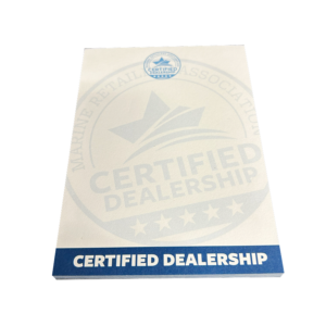 Paper notepad with the MRAA Certified Dealership logo and Certified Dealership in a blue bar at the bottom
